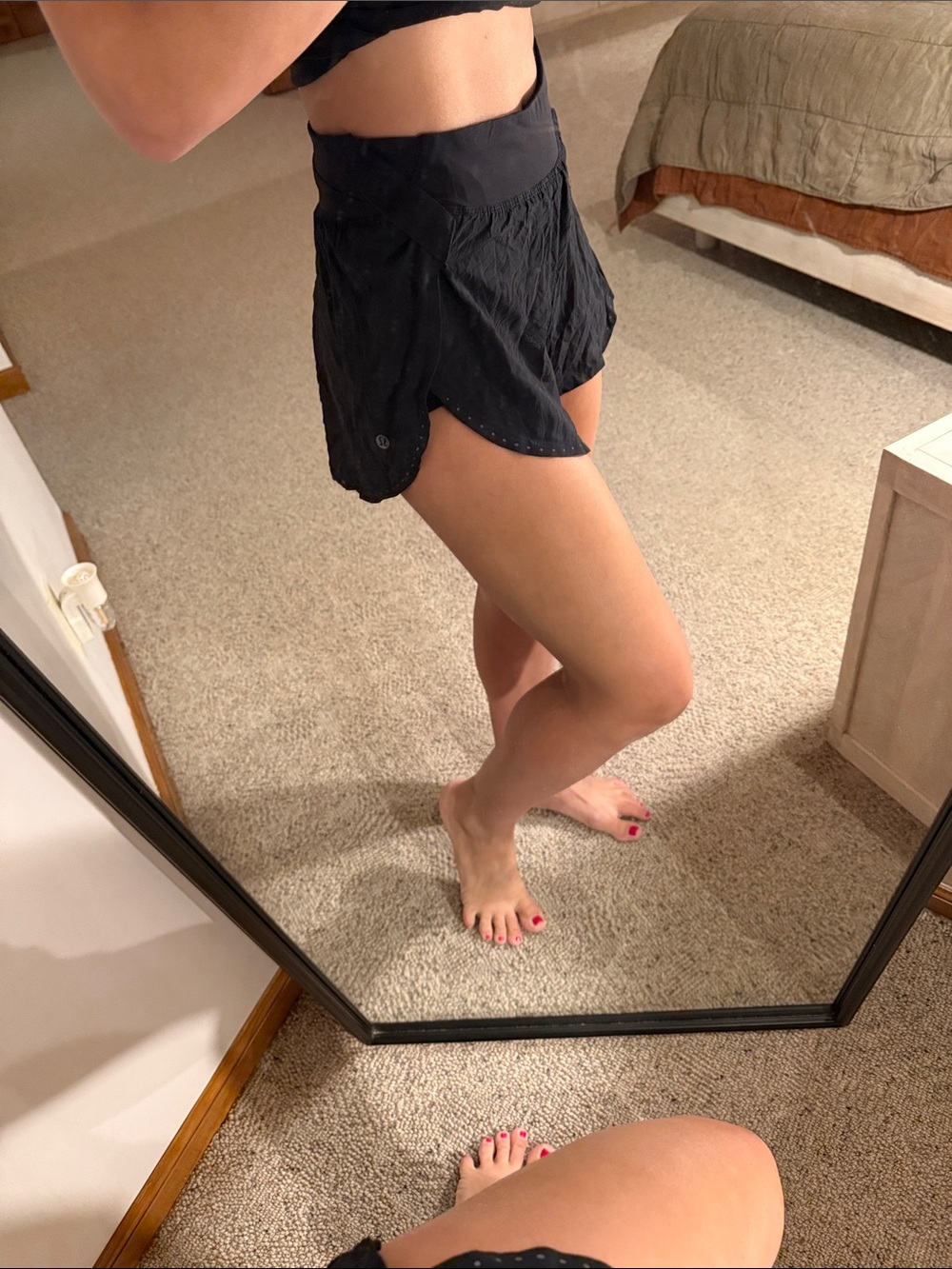 Lululemon black high waisted split leg short size 4